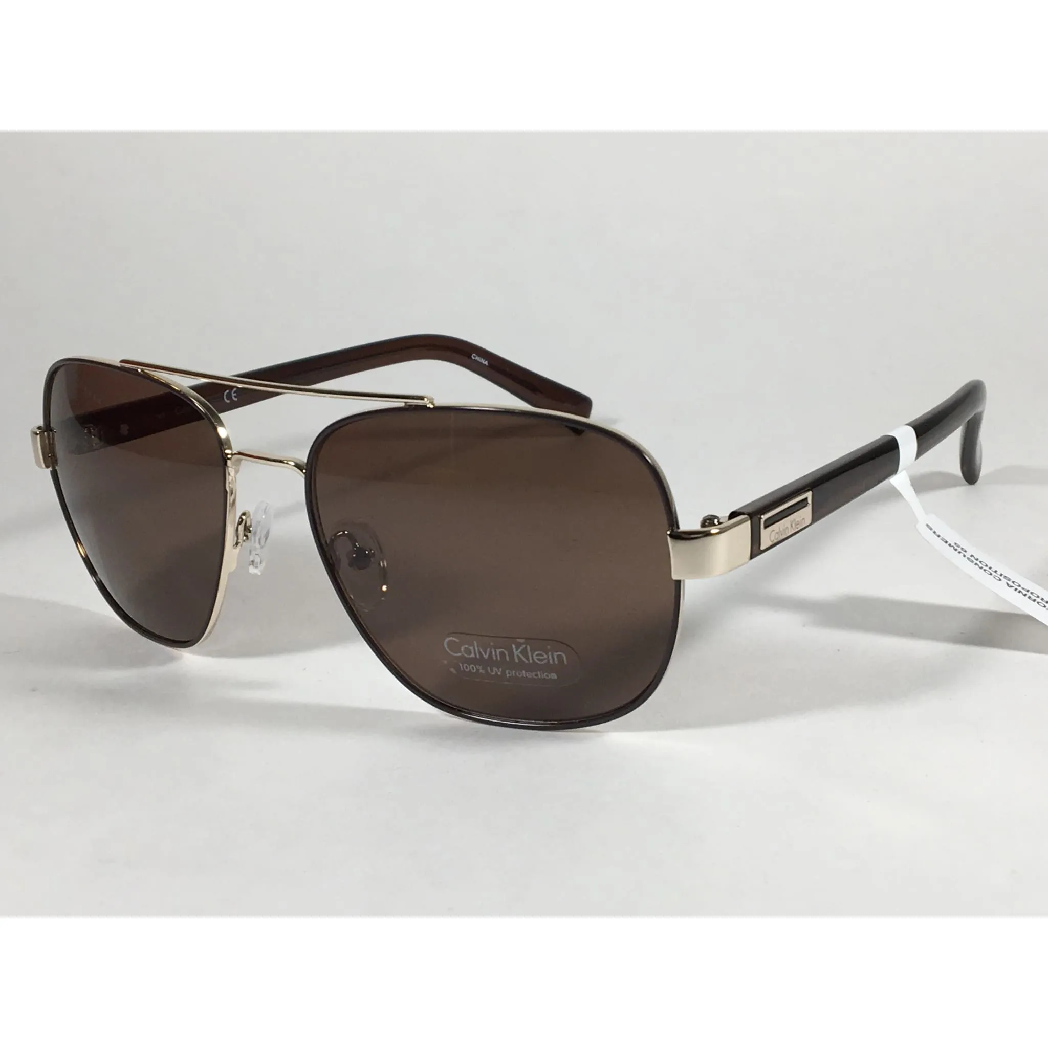 Calvin Klein R357S 210 Aviator Pilot Sunglasses Gold And Brown Frame With Brown Lens
