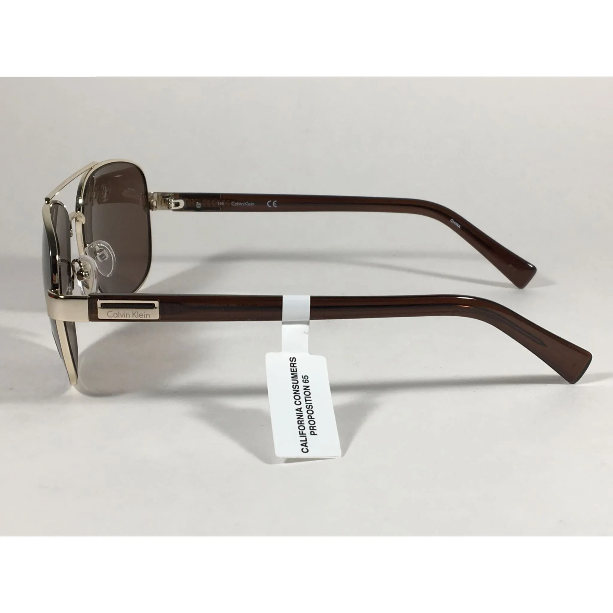 Calvin Klein R357S 210 Aviator Pilot Sunglasses Gold And Brown Frame With Brown Lens