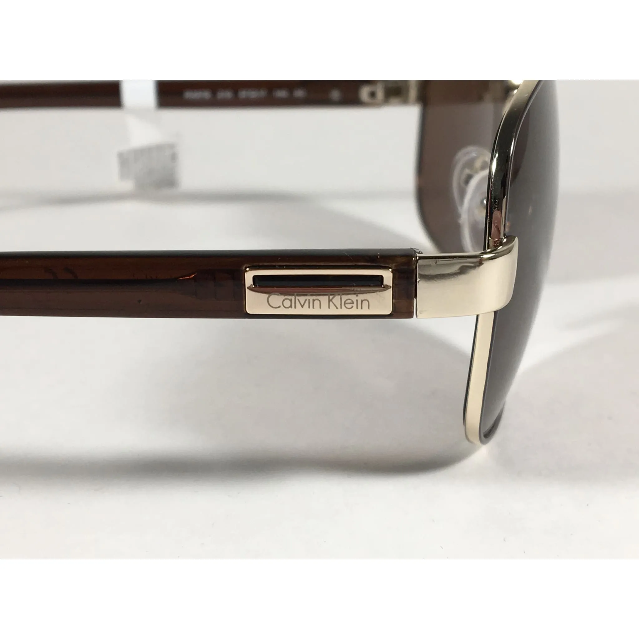 Calvin Klein R357S 210 Aviator Pilot Sunglasses Gold And Brown Frame With Brown Lens
