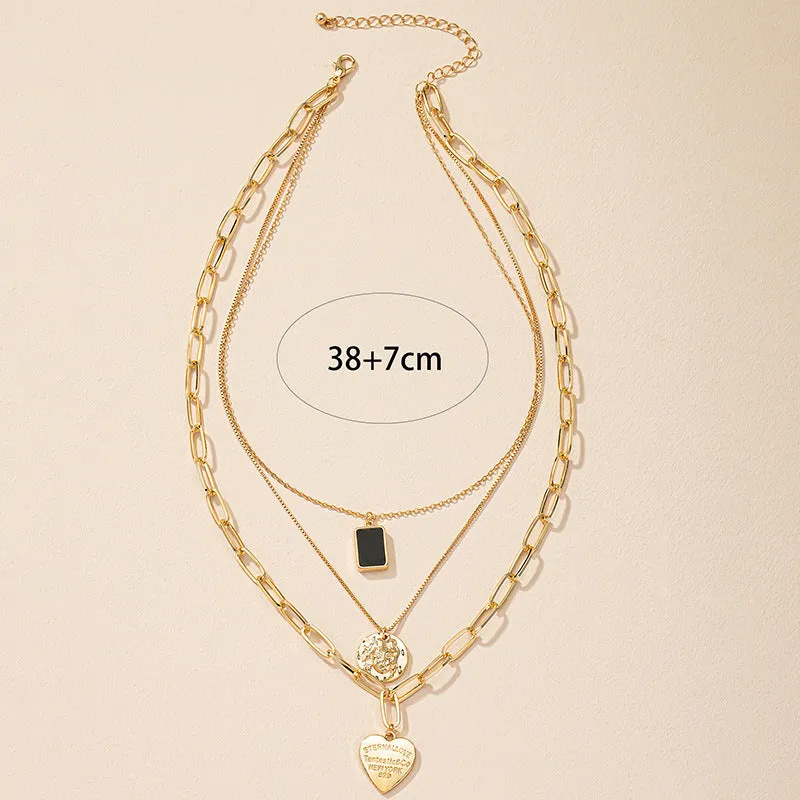 Golden Heart Pendant Collarbone Necklace with Luxe Layered Design
