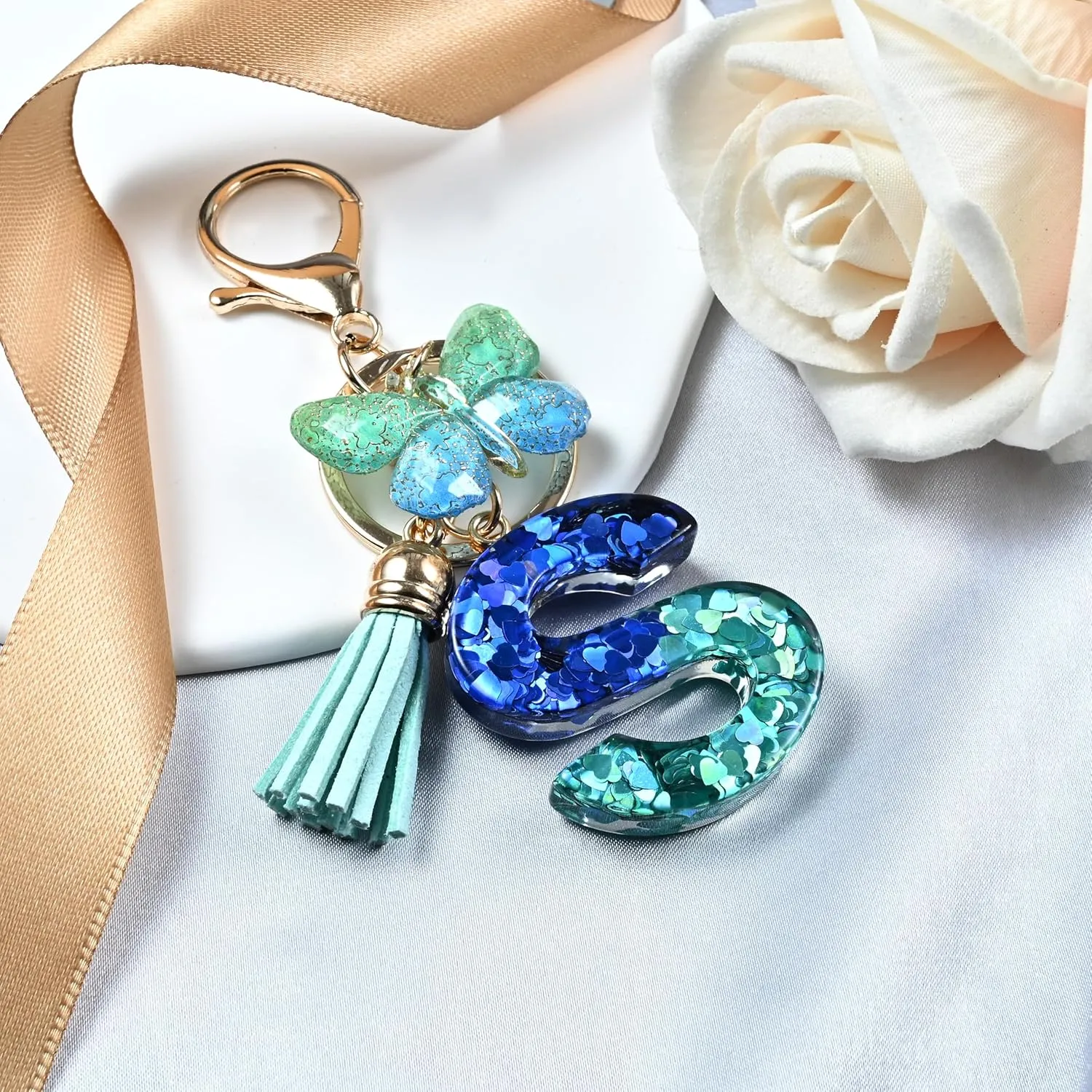 JINGUAZI Initial letter Keychains for Women Tassel Butterfly Pink Purple Cute Car Keychain for Wallet Backpack bag charm